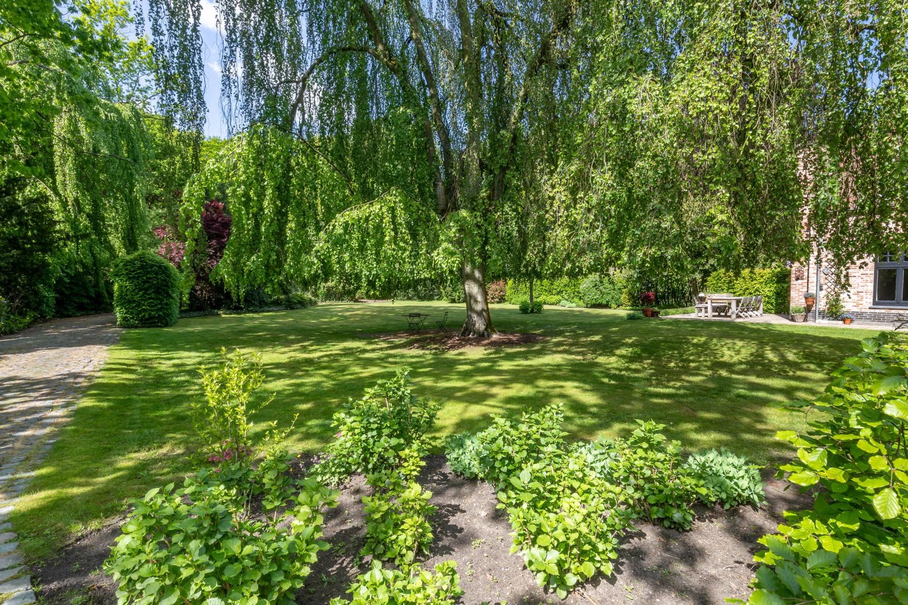 Karaktervolle rieten kap woning met aanbouw op 4.334 m² (ZW) — foto 46