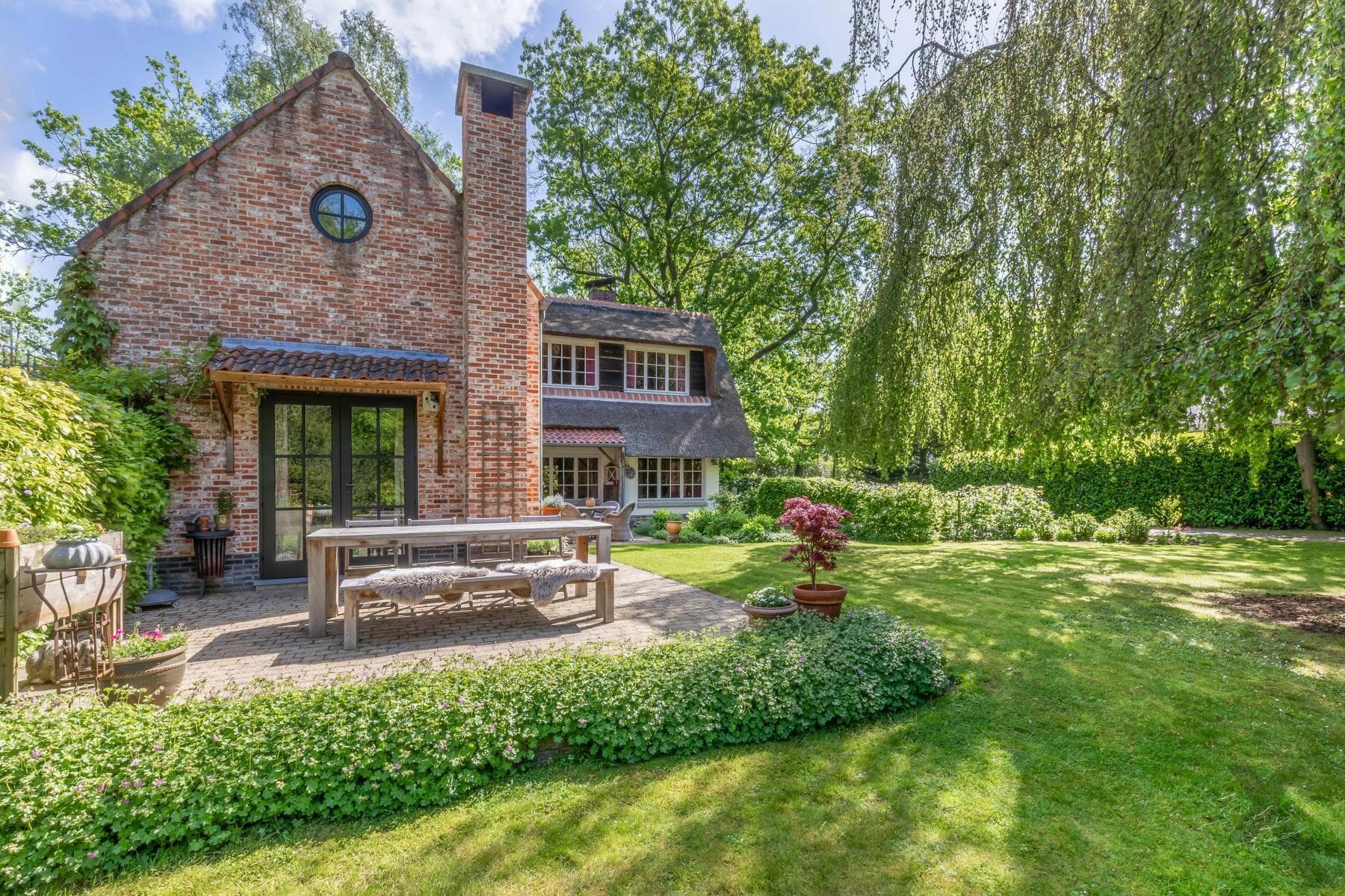 Karaktervolle rieten kap woning met aanbouw op 4.334 m² (ZW) — foto 28