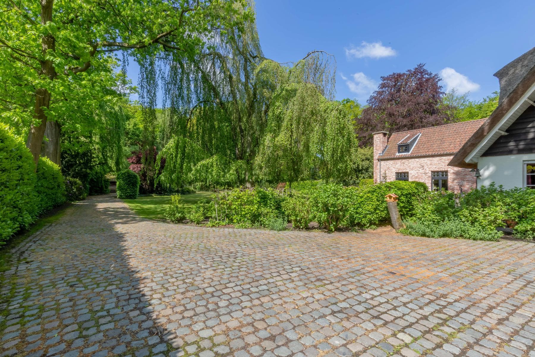 Karaktervolle rieten kap woning met aanbouw op 4.334 m² (ZW) — foto 49