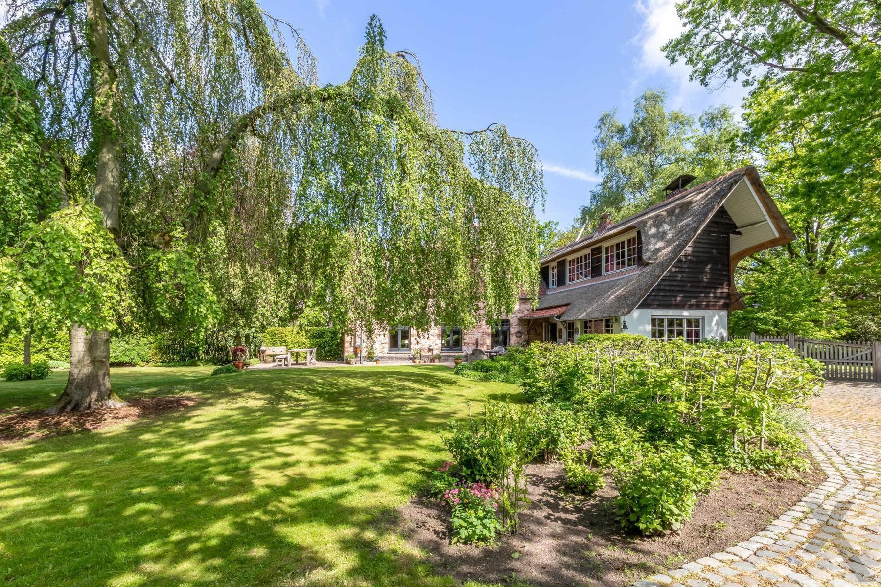 Karaktervolle rieten kap woning met aanbouw op 4.334 m² (ZW) — foto 36