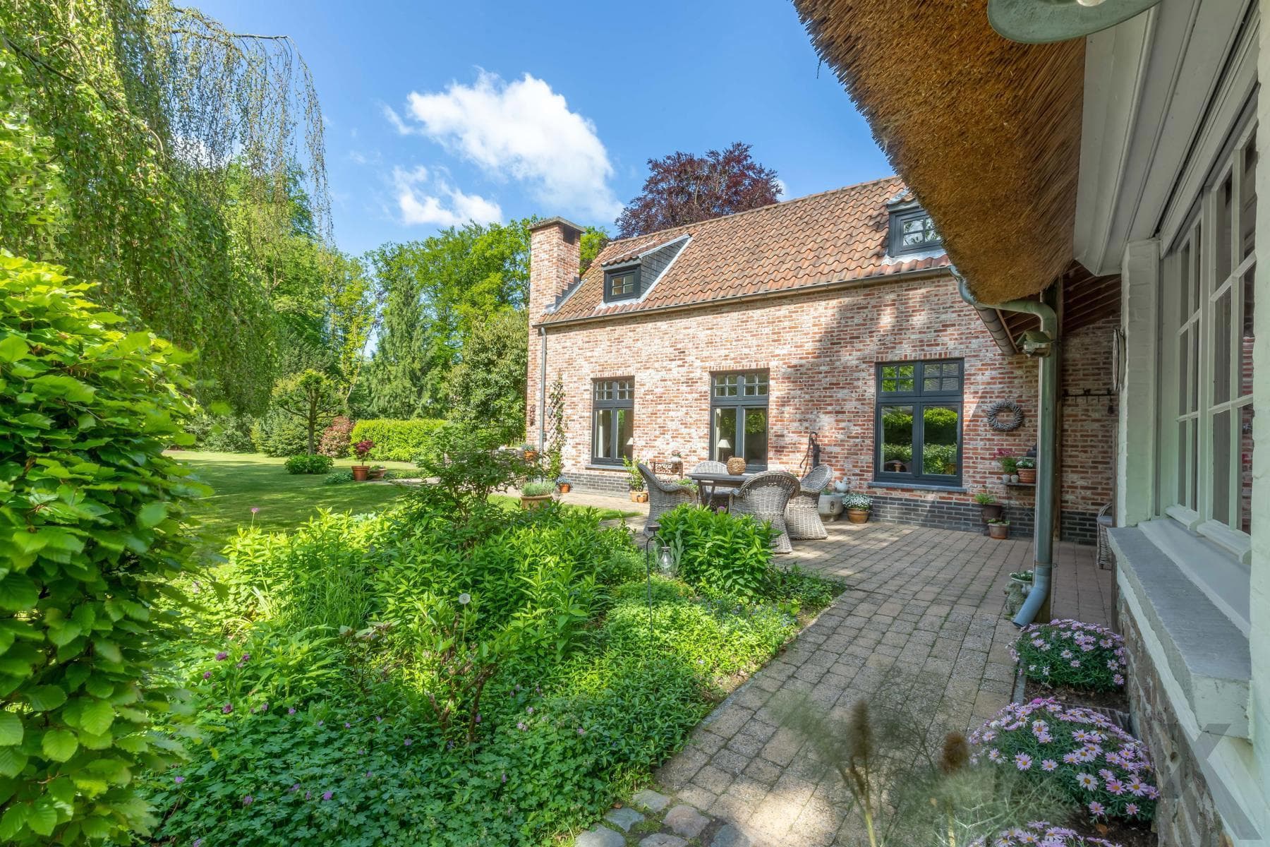 Karaktervolle rieten kap woning met aanbouw op 4.334 m² (ZW) — foto 40